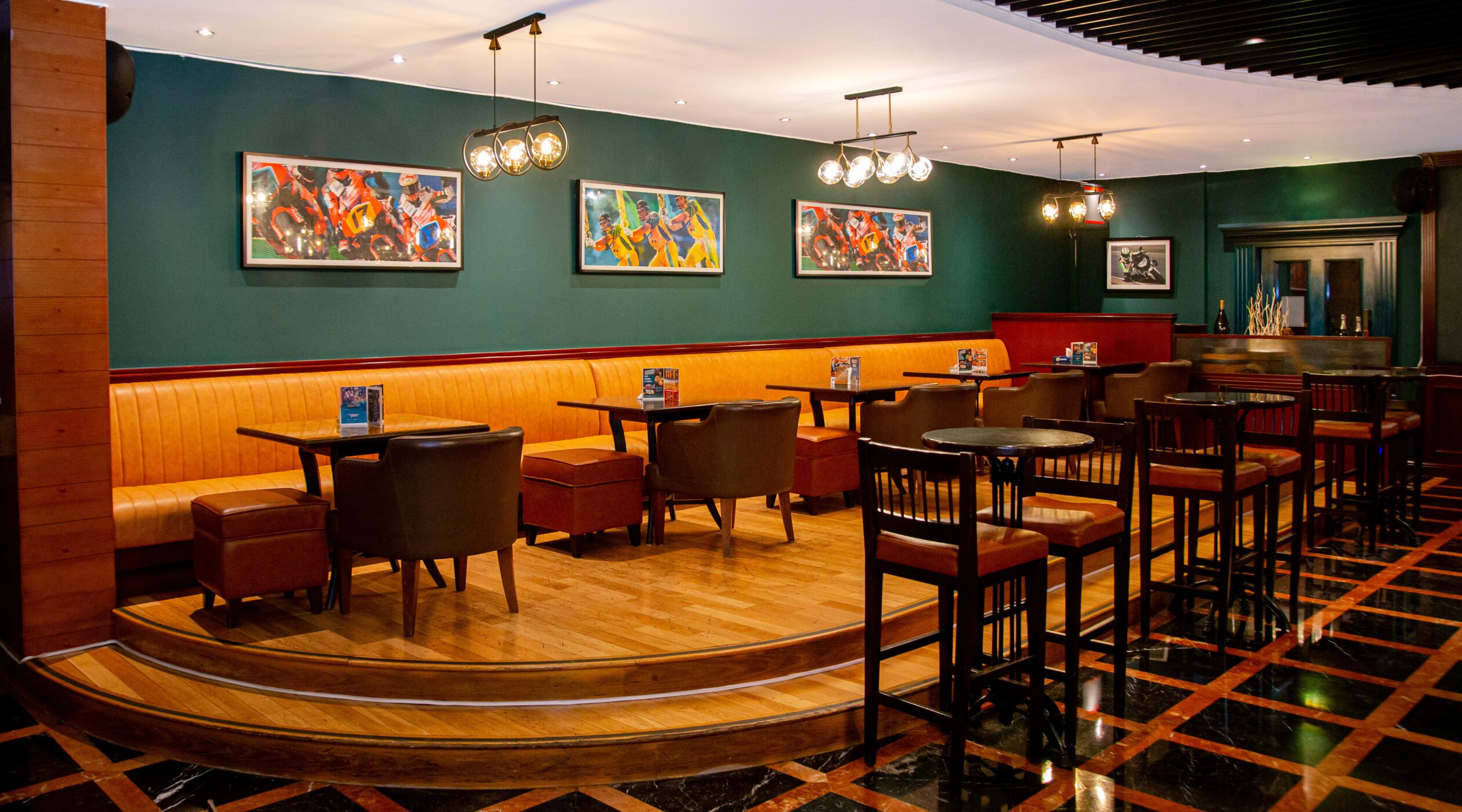 Table seating at The Grandstand Sports Bar at Park Regis Kris Kin